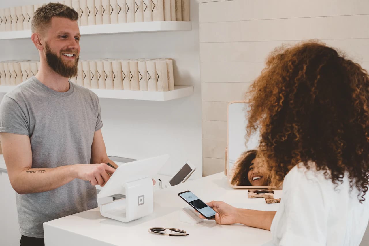 Customer support specialist reviewing an AI-assisted enquiry conversation with human escalation controls