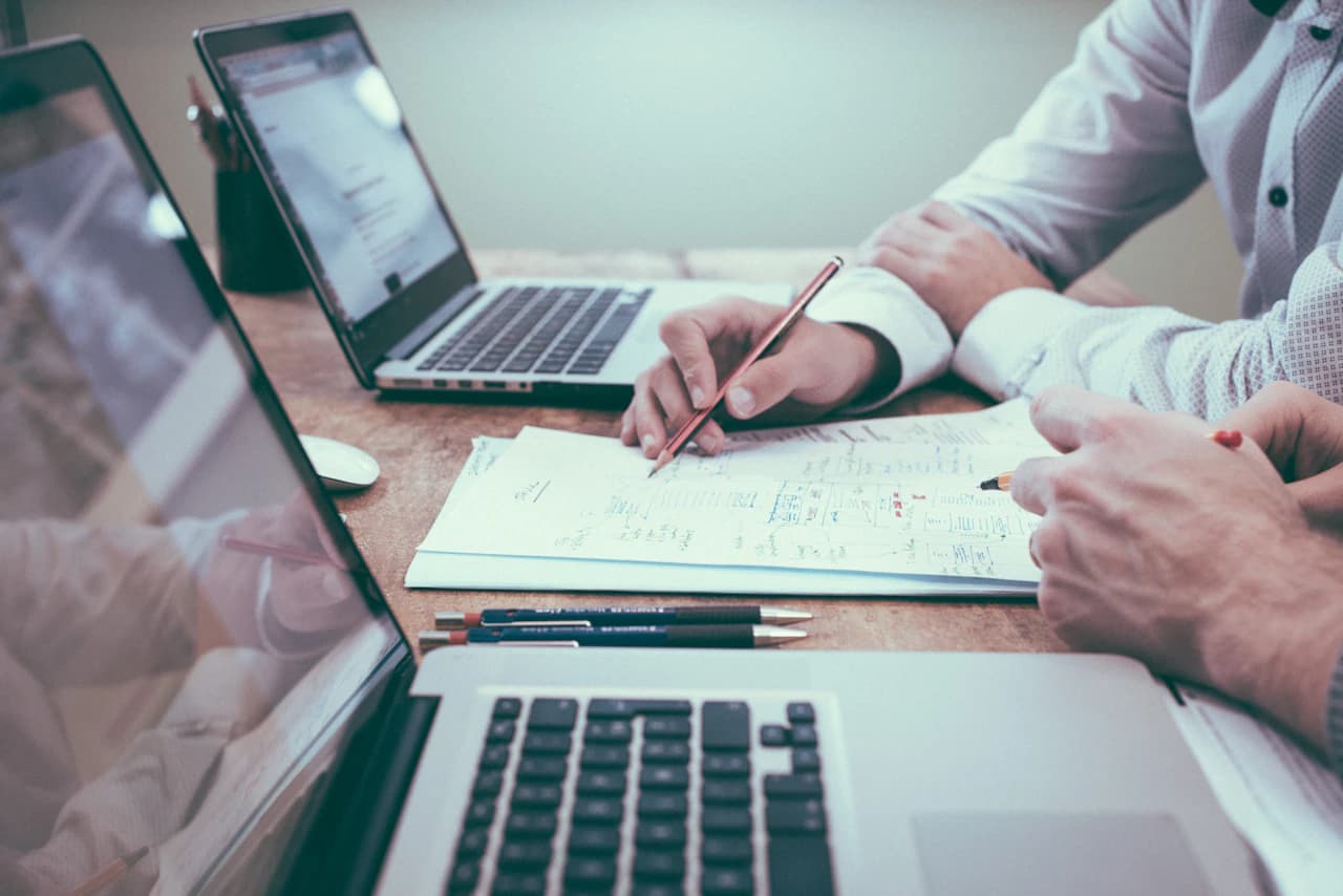 Finance and operations professional verifying extracted invoice and purchase order fields before ERP export